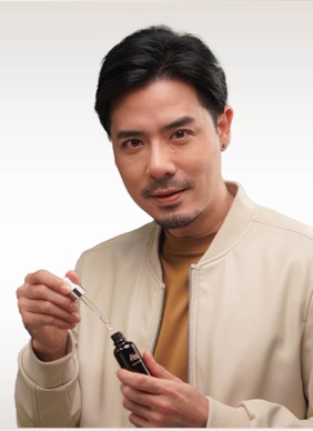 Person Using Hair Tonic Person Using Hair Tonic